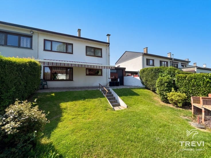 Jolie maison 3 façades avec beau jardin dans un joli quartie