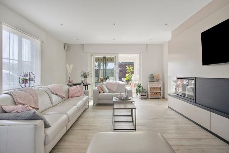A beautifully maintained, spacious 4-bedroom home with a gar
