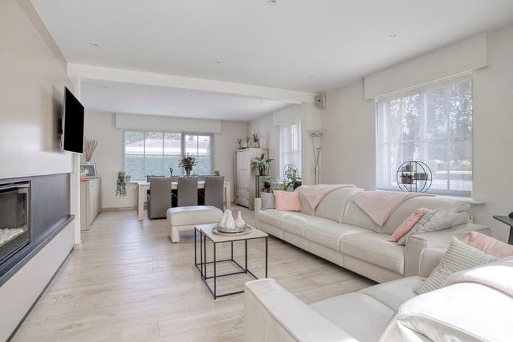 A beautifully maintained, spacious 4-bedroom home with a gar