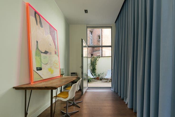 Unique townhouse with a loft-style feel and a huge garage in