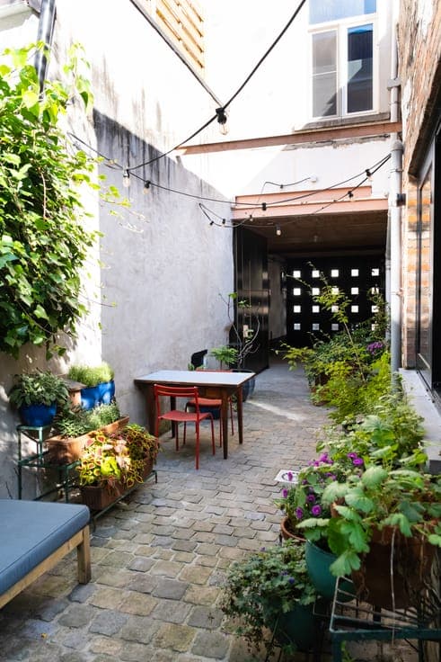 Charming townhouse with garage and a sunny city courtyard.