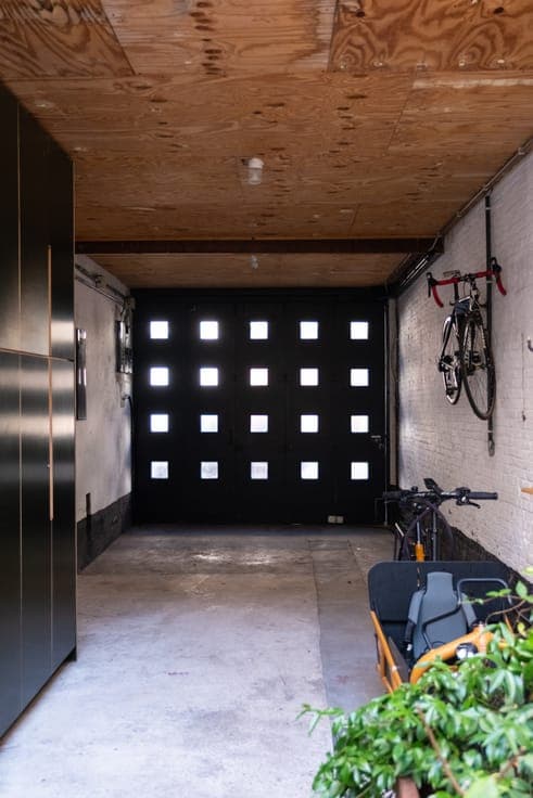 Charming townhouse with garage and a sunny city courtyard.