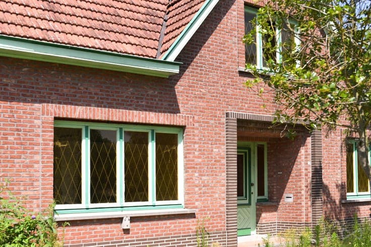 A detached house in need of renovation.