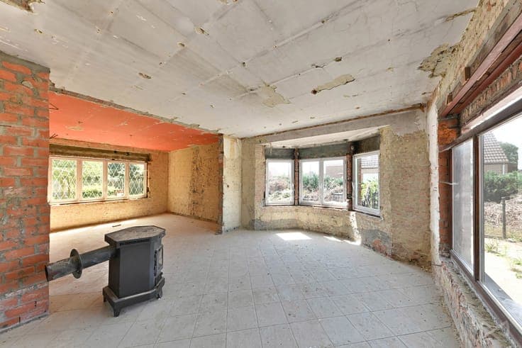 A detached house in need of renovation.