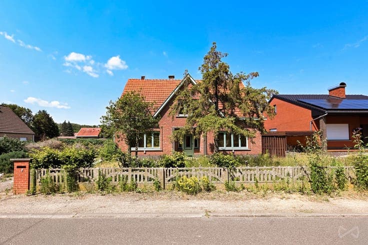 A detached house in need of renovation.