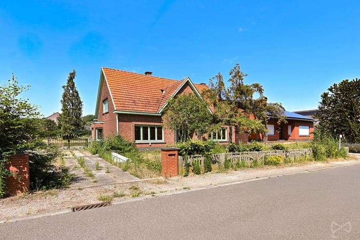 A detached house in need of renovation.