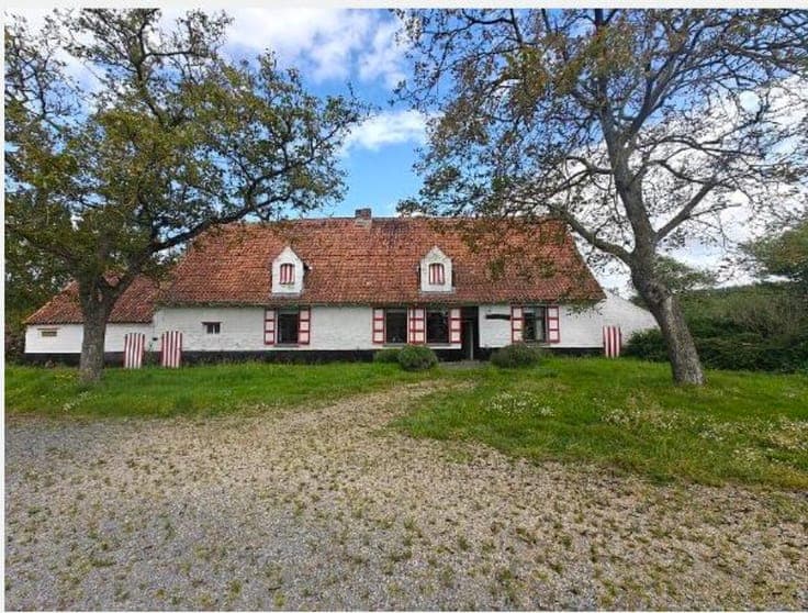 Farmhouse with farm buildings