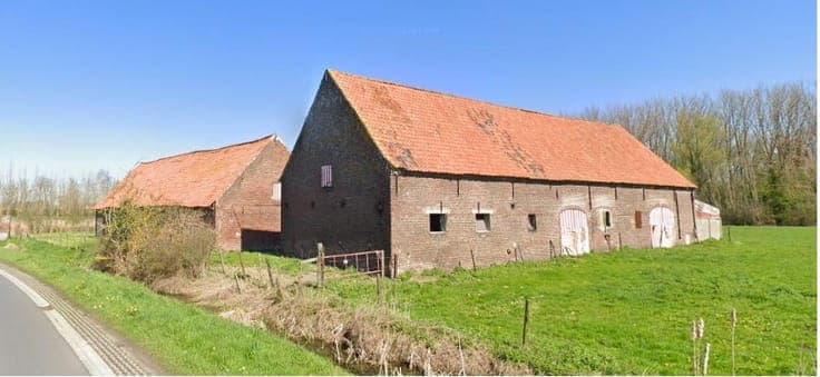 Farmhouse with farm buildings