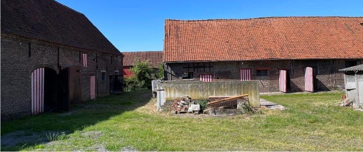 Farmhouse with farm buildings