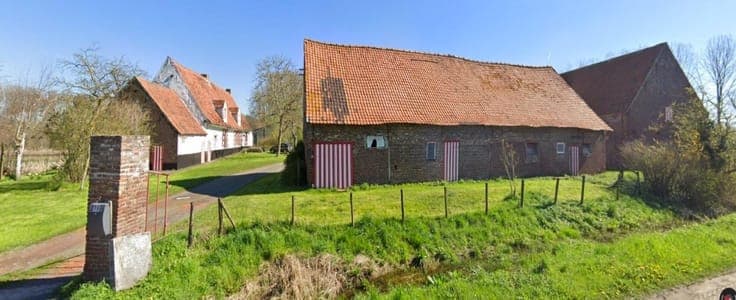 Farmhouse with farm buildings