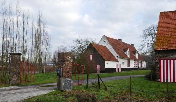 Farmhouse with farm buildings