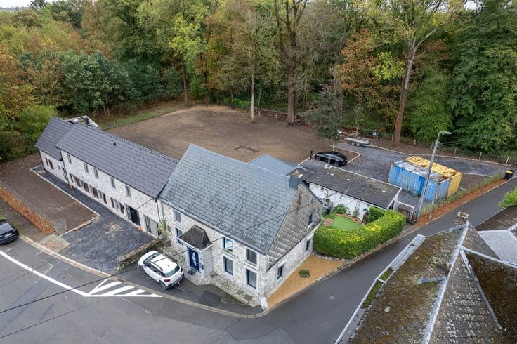 Beautiful three-sided stone house