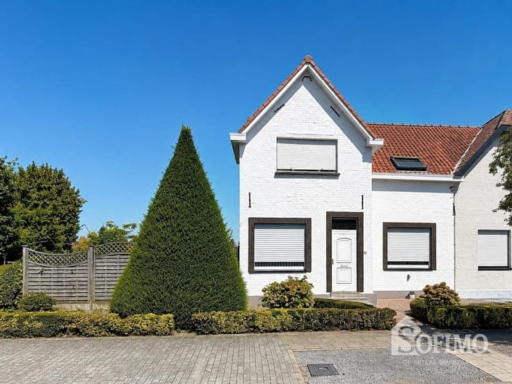 Halfopen woning met garage en tuin