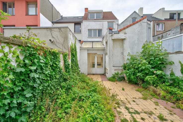 A family home in need of some updating, with a sunny cour...