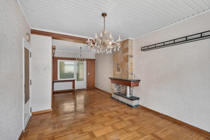 A family home in need of some updating, with a sunny cour...