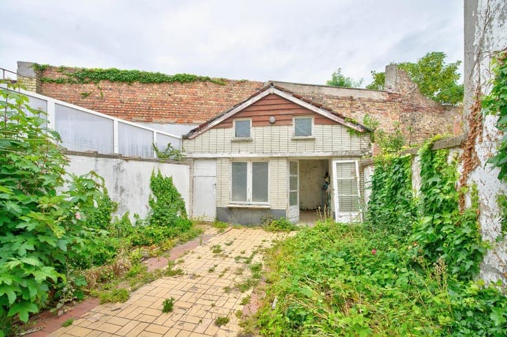 A family home in need of some updating, with a sunny cour...