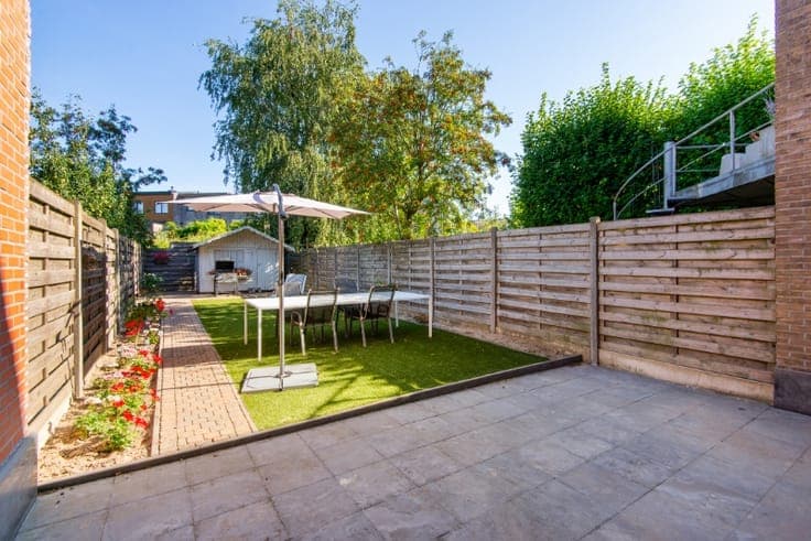 Rustig & centraal gelegen rijwoning met 3 SLK, tuin & garage
