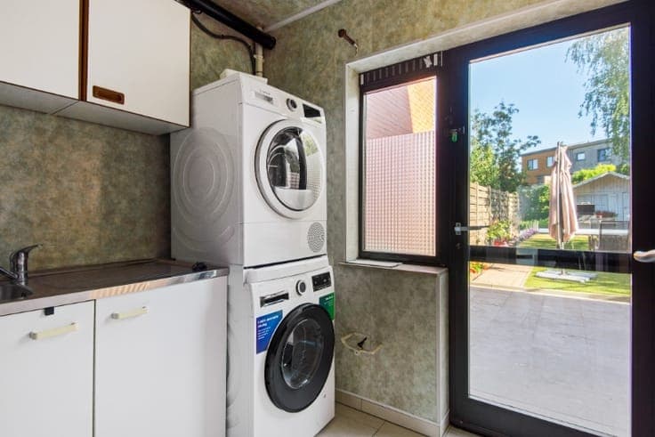 Rustig & centraal gelegen rijwoning met 3 SLK, tuin & garage