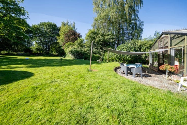 A magnificent house set in lush green surroundings