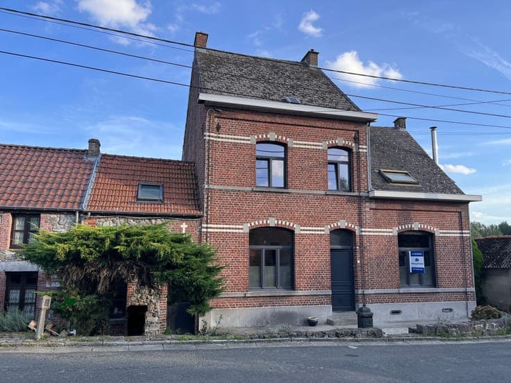 A large, charming house with a separate second home.