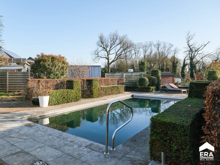 Architectural open house with garden & pool