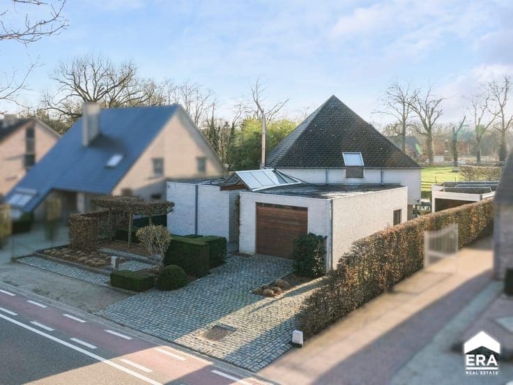 Architectural open house with garden & pool