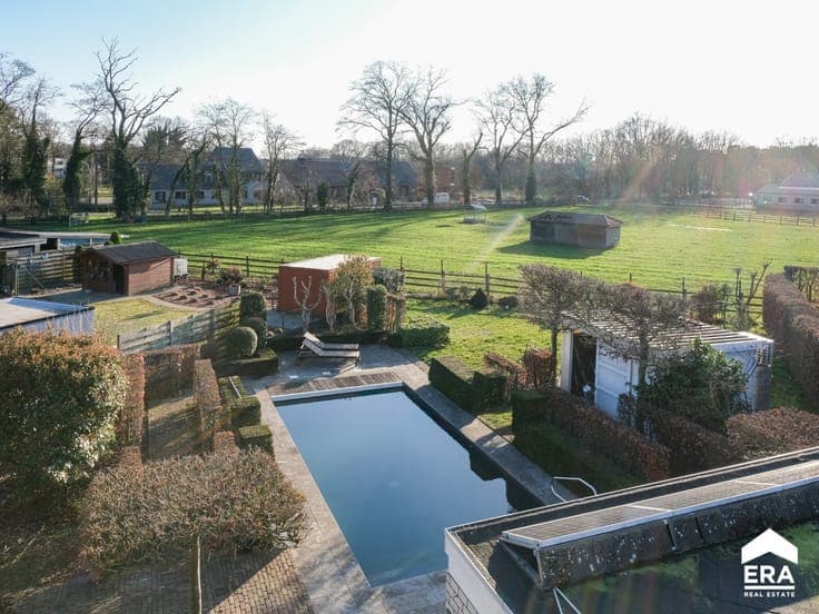 Architectural open house with garden & pool
