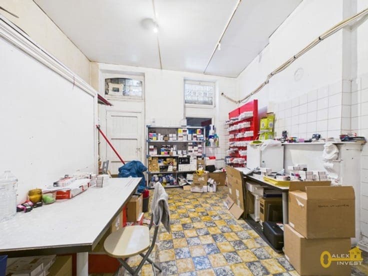 Income Property: 2 COMMERCIAL UNITS + 6 STUDIOS + 1 APARTMEN