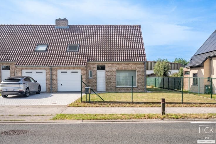 KRUISHOUTEM - Instapklare woning met 3 SLPK, garage én zo...
