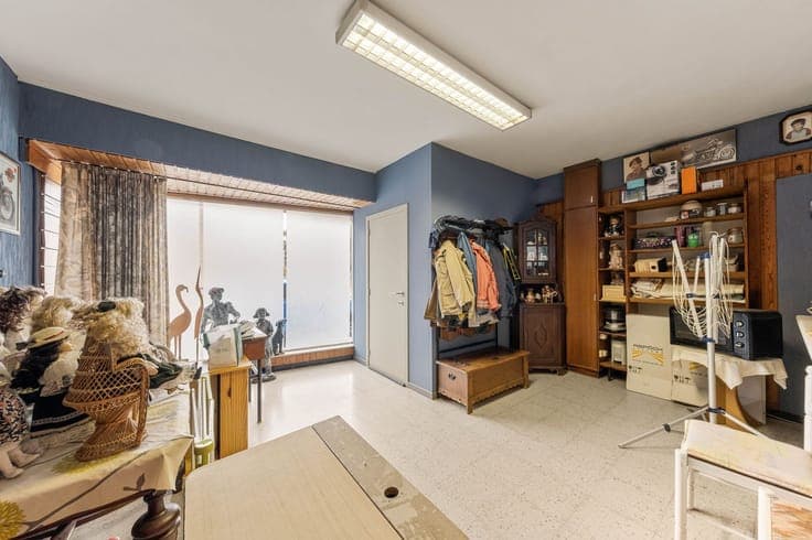 Ruime woning met grote koer en loods in hartje Gits