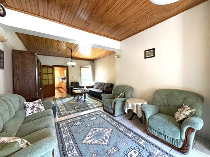 MAISON FAMILIALE– 4 CHAMBRES, GARAGE ET JARDIN