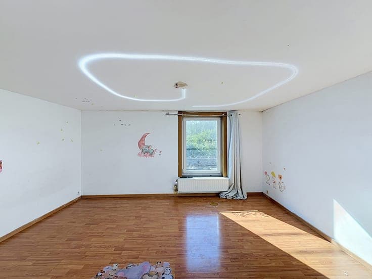 Maison idéalement située avec jardin !