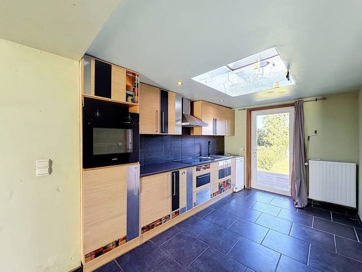 Maison idéalement située avec jardin !