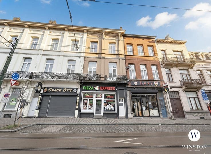 Investment property -commercial space + 2 residential units