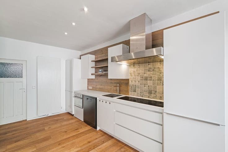 Renovated, sunny city home with a landscaped garden.