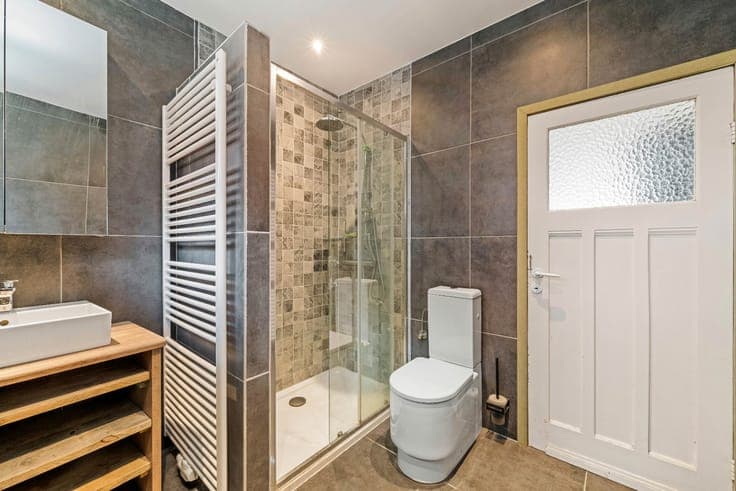 Renovated, sunny city home with a landscaped garden.