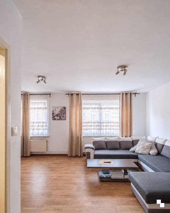 Bel-etage woning met drie slaapkamers en tuin ten noorden...
