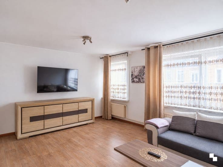 Bel-etage woning met drie slaapkamers en tuin ten noorden...