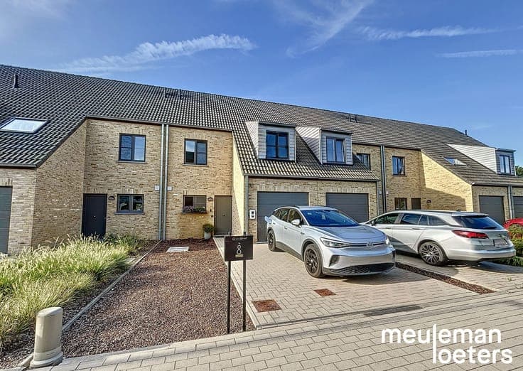 Move-in ready energy-efficient home with three bedrooms, gar