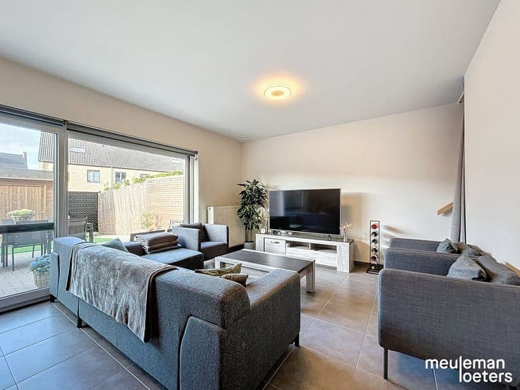 Move-in ready energy-efficient home with three bedrooms, gar