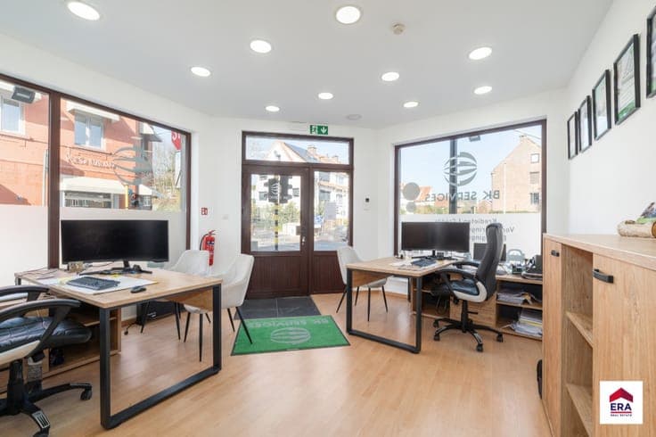 Investment property with 3 app, 1 office & 6 garages