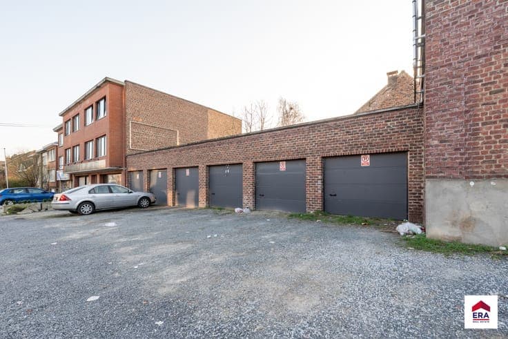 Investment property with 3 app, 1 office & 6 garages