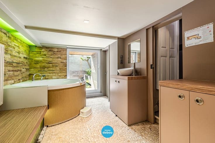 Karaktervolle woning met zuidgerichte stadstuin & wellness