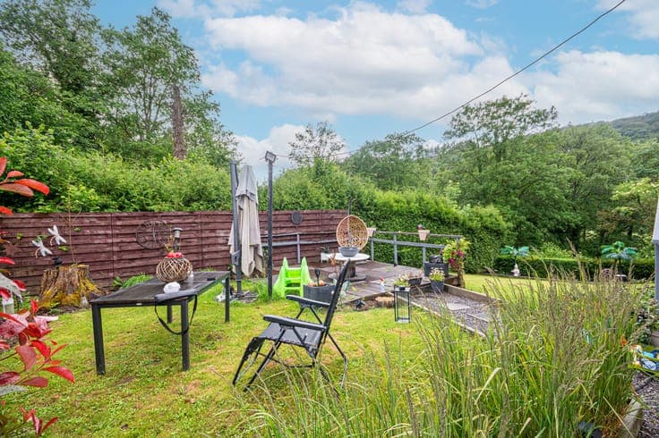 Detached house with a garden and garage