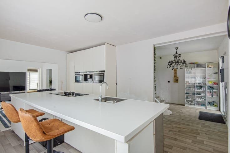 Renovatiewoning met vergund uitbreidingsproject op perceel v