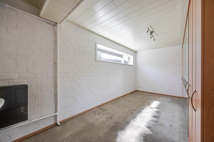 Bel-etagewoning met open zicht, tuin en garage met oprit