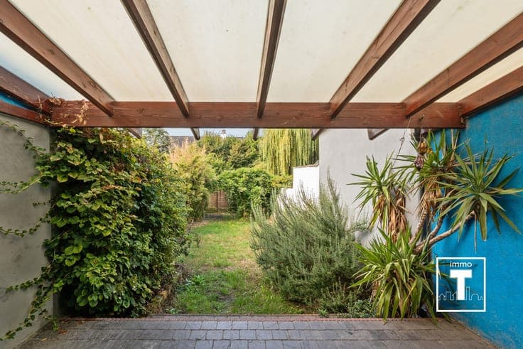 Ruime rijwoning met 4 slaapkamers en zonnige tuin op topl...