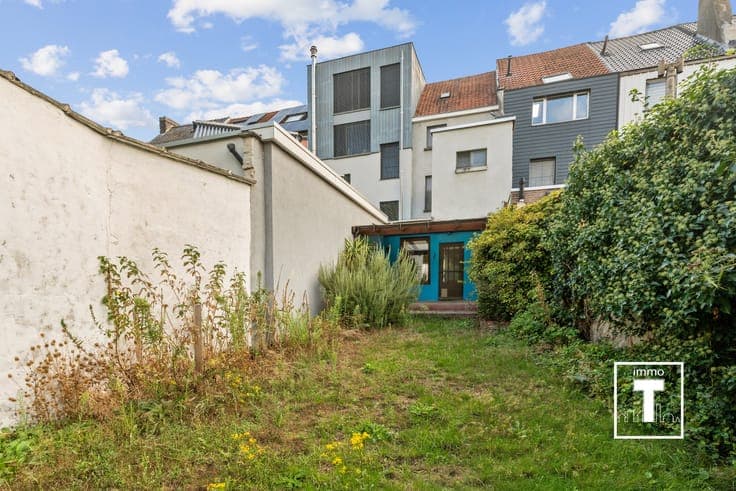 Ruime rijwoning met 4 slaapkamers en zonnige tuin op topl...