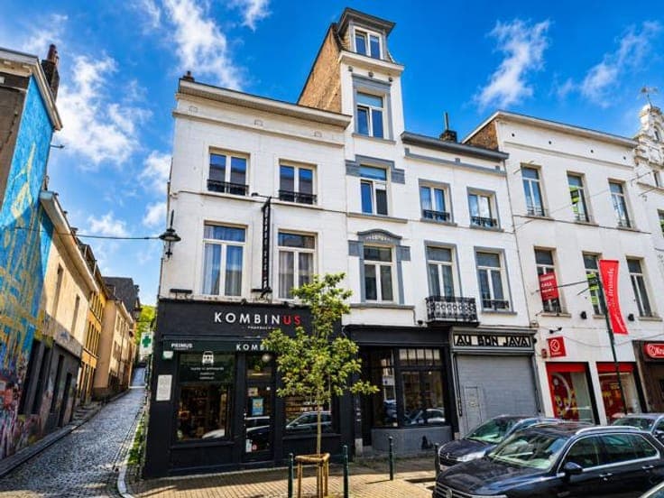 Renovated Mixed-Use Building – 4 Studios & Retail Unit