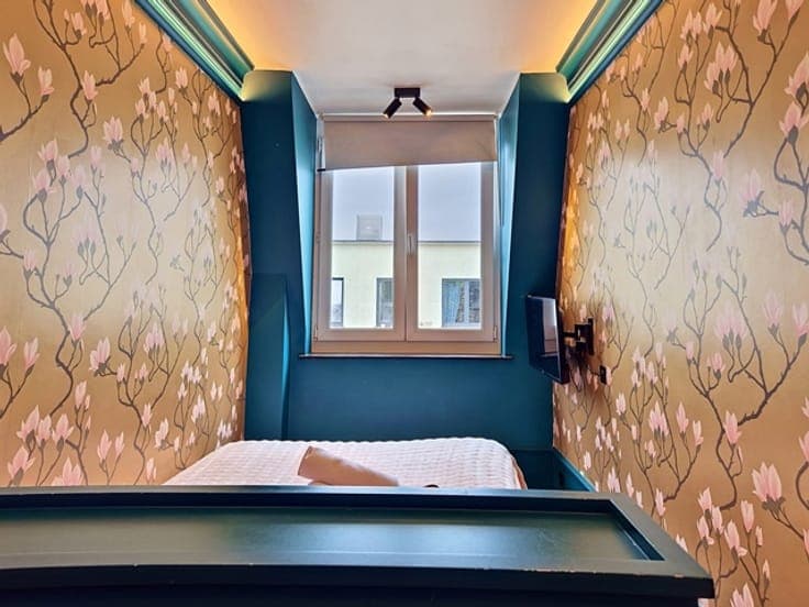 Renovated Mixed-Use Building – 4 Studios & Retail Unit